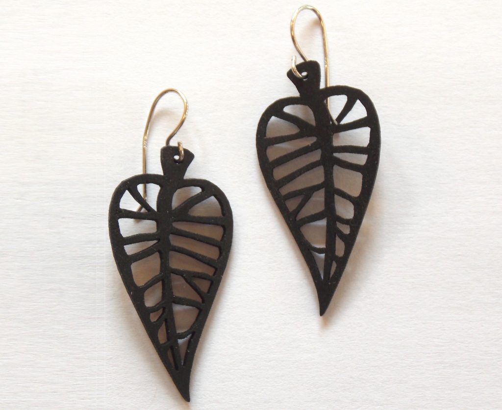 A pair of leaf shaped earrings